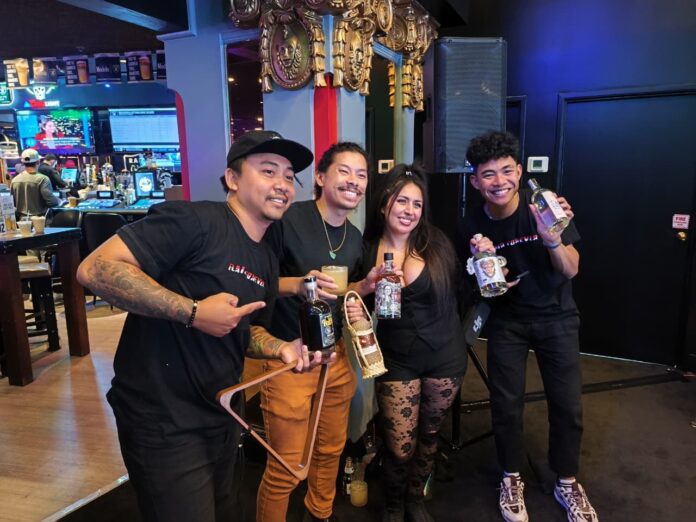 Empat botol arak Bali yang dilelang dalam acara amal Charity F@!& Cancer Flair Show di Las Vegas.