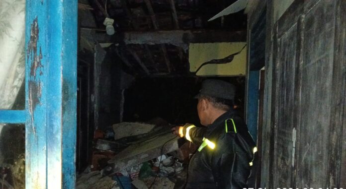 Peristiwa tanah longsor yang berdampak pada tiga bangunan rumah di BTN Sanggulan, Kecamatan Kediri, Kabupaten Tabanan, Bali.